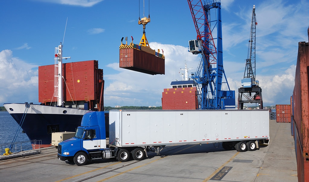 cargo ship and semi truck 